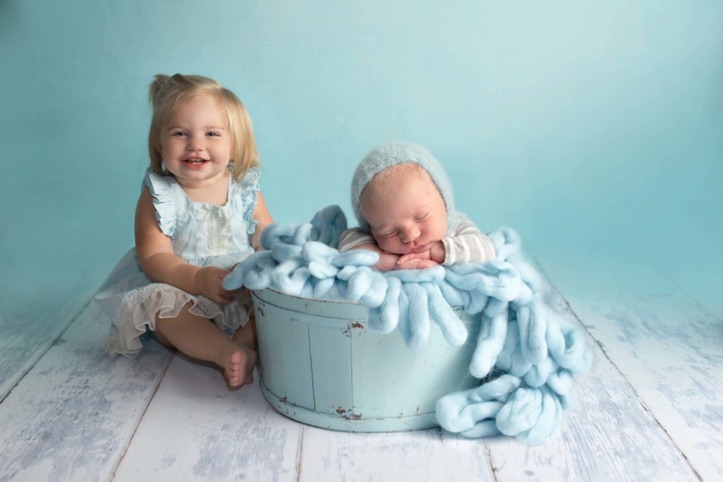 North Dallas Newborn Photographer works with newborn baby boy and big sister