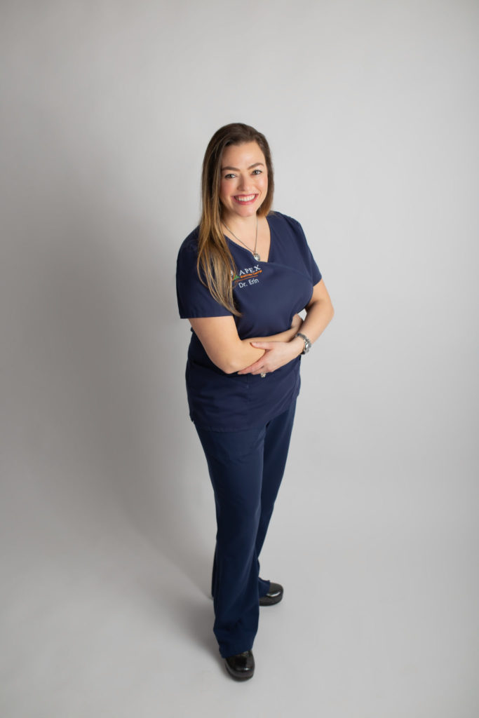 Pregnancy, maternity, newborn, child and family chiropractor pictured in professional portrait Dr. Erin Calaway of Addison and Far North Dallas